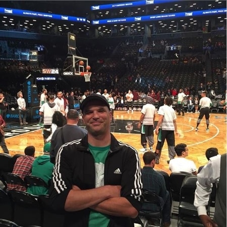 Matt Taibbi at The Barclays Center enjoying a basketball game